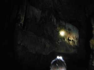 Limestone formation in the shape of a beastly head illuminated by a headlamp, Barton Creek Cave, Belize, June 9, 2013